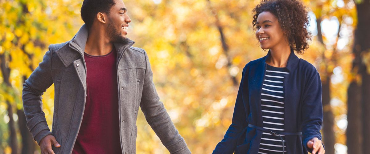 young couple going for a walk at a park like Saxe Point or MacAulay Point near The Proxima in Esquimalt, Victoria, Canada