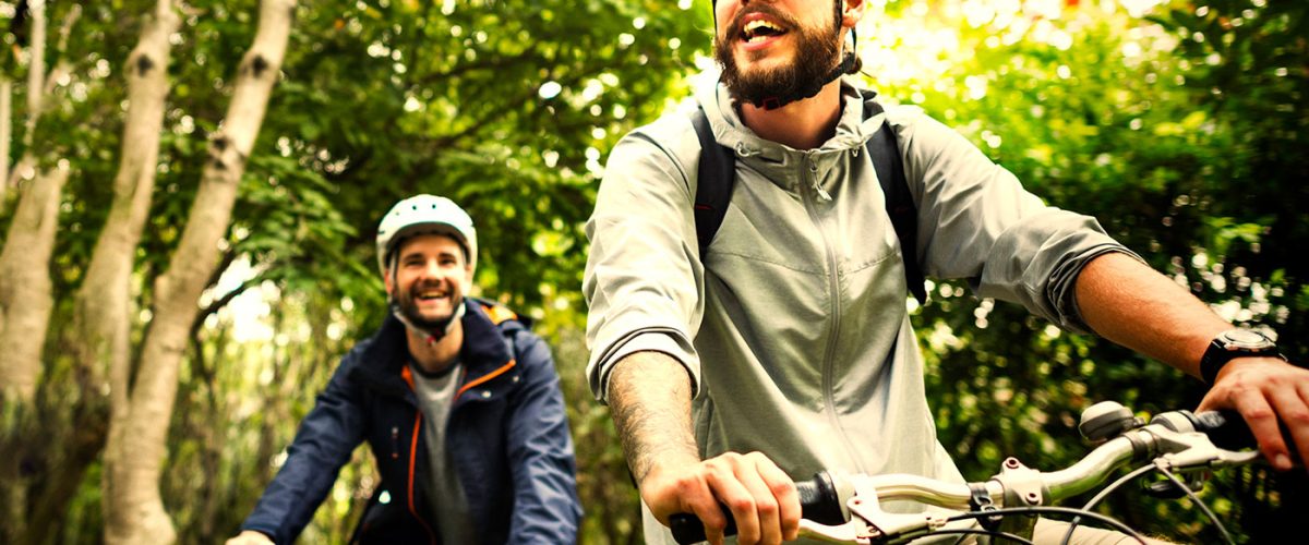 Gay couple or friends exploring the area in Esquimalt BC near The Proxima by Saxe Point Park